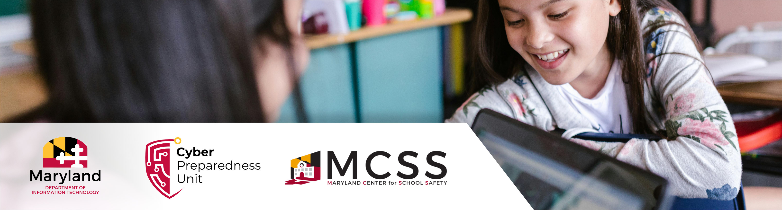 Header image of a child at a school desk with a computer, overlaid with the logos of the MDEM Cyberpreparedness Unit, Maryland Center for School Safety, and Maryland Department of Information Technology