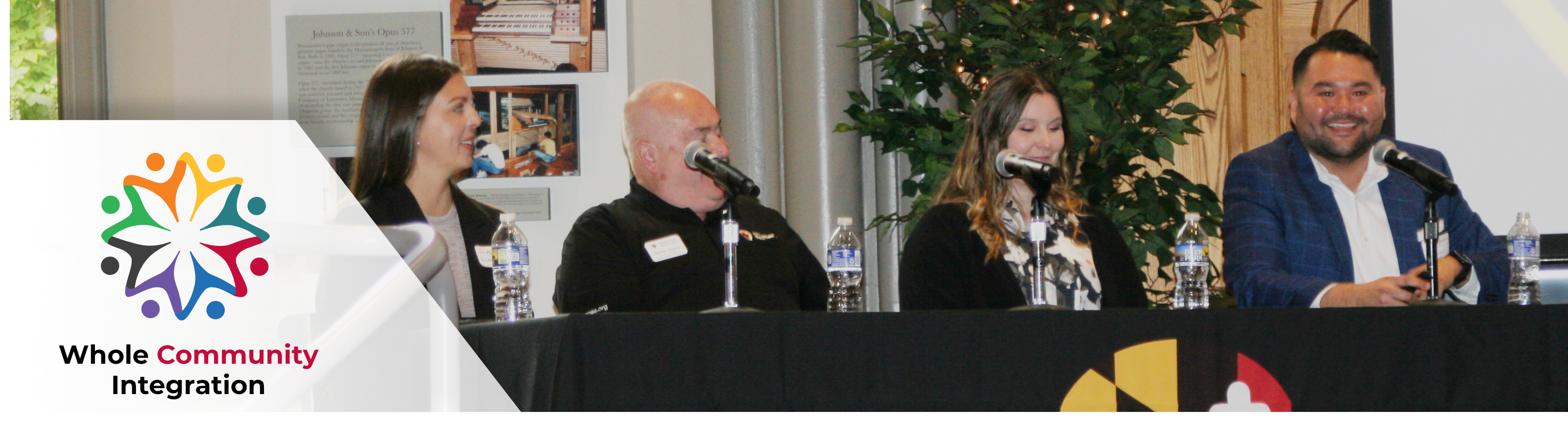 Members of the WCI Branch speaking at an event with representatives of community groups and businesses